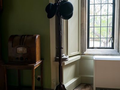 Golden sunlight streaming through a window onto a wooden floor